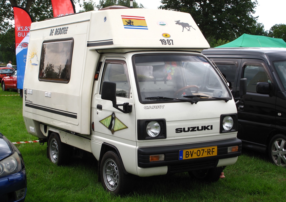 Compact kei truck camper conversion with pop-up roof