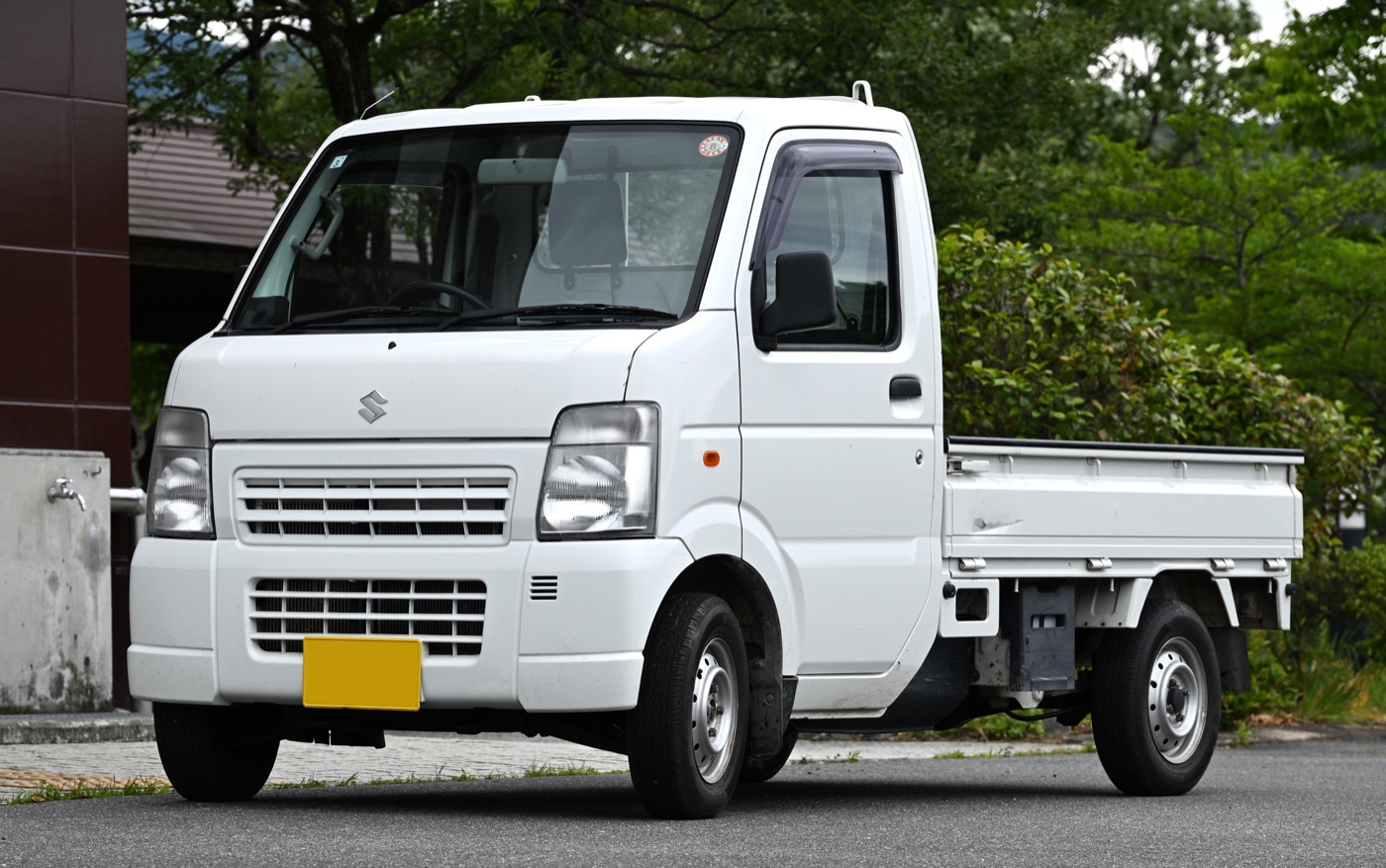 A 2009 to 2012 Suzuki Carry DA63T kei truck, the kind of clean fuel injected truck that crosses the 25 year import threshold in the 2030s